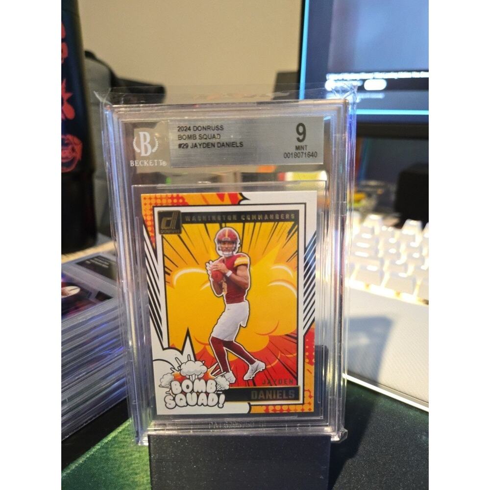 2024 Panini Donruss - Bomb Squad Jayden Daniels #29 (RC) Beckett 9